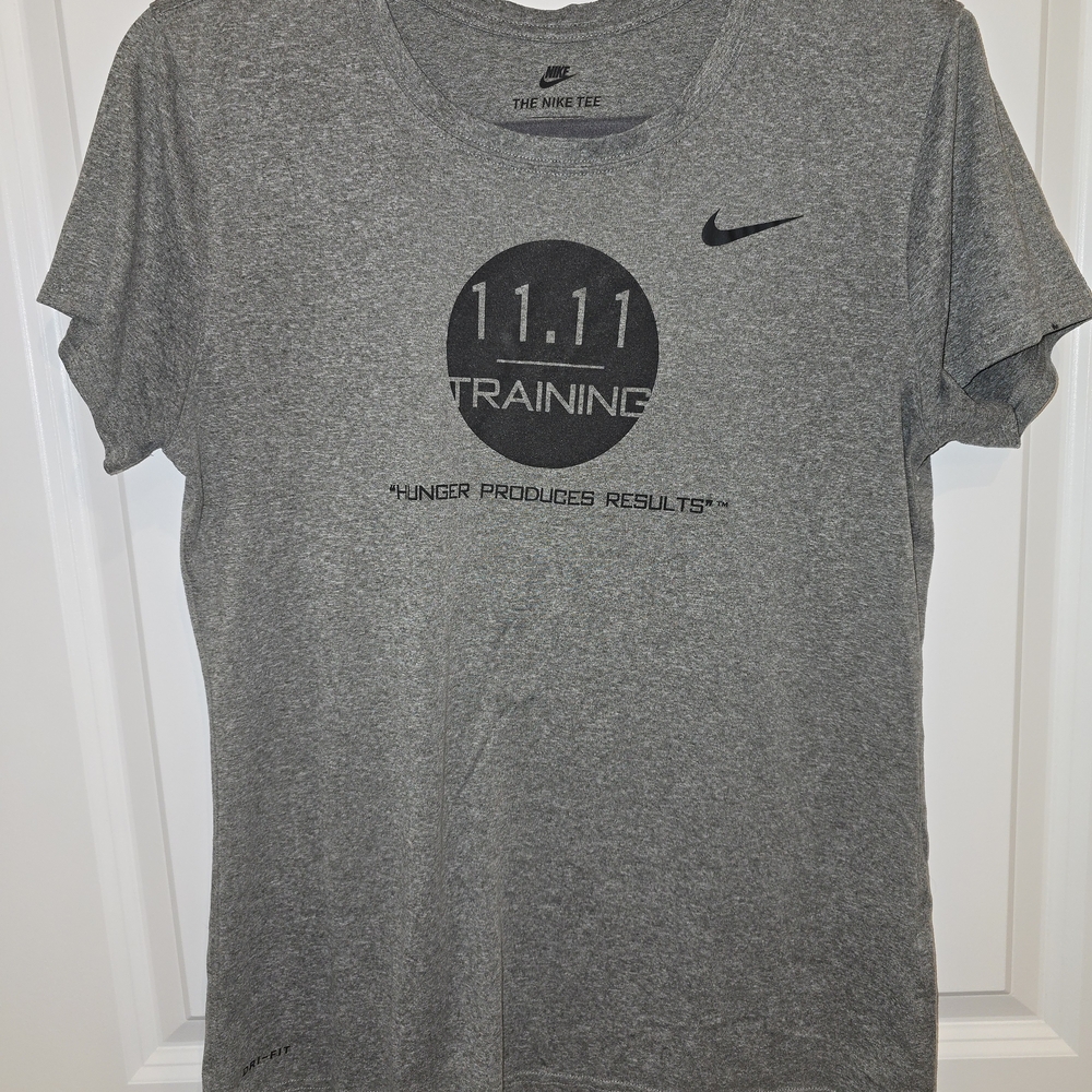The Nike Tee Dri Fit 11.11 Hunger Produces Results Gray Training T-Shirt Large